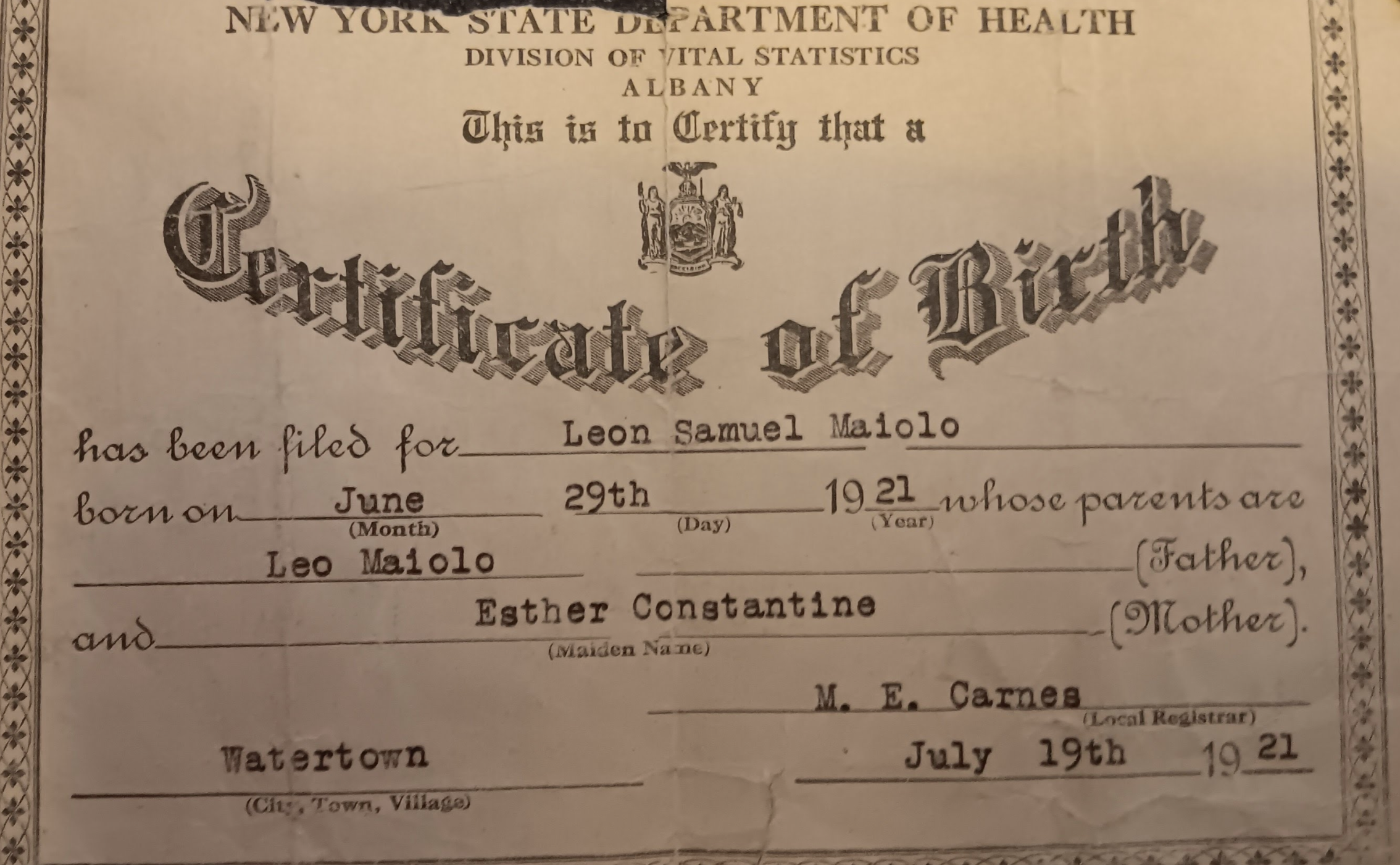 A certificate of birth

Description automatically generated